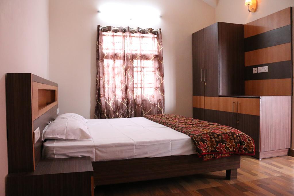 Adhithya Holidays Кодайканал Номер фото